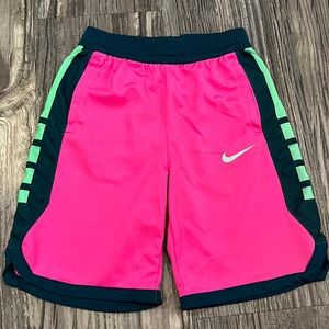 Purple and green Nike shorts.
